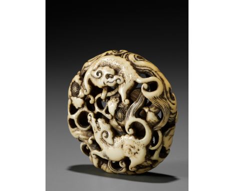 A RARE MARINE IVORY RYUSA MANJU NETSUKE WITH TWO BAKUStyle of Rensai, unsignedJapan, Tokyo, Asakusa District, mid to late 19t