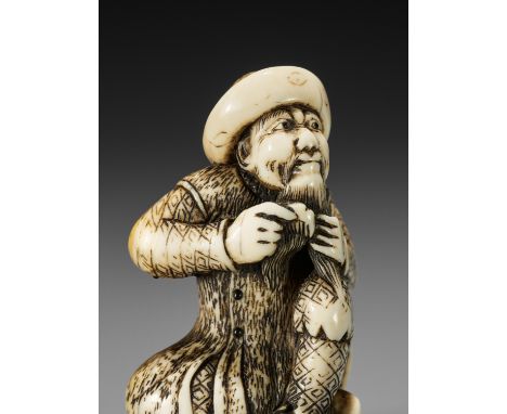 AN IVORY NETSUKE OF A DUTCHMAN COMBING HIS BEARDUnsignedJapan, 18th century, Edo period (1615-1868)Seated with one knee raise