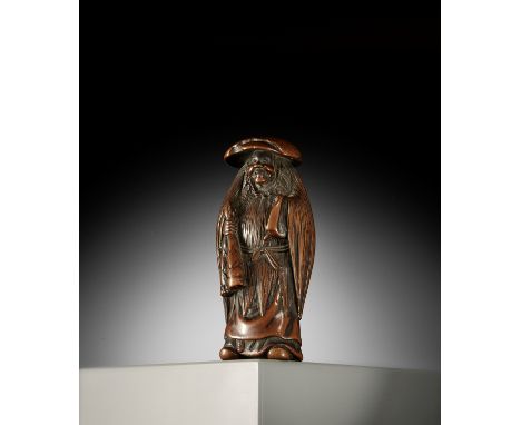 A LARGE WOOD NETSUKE OF MOSOUnsignedJapan, 18th century, Edo period (1615-1868)Well-carved as Moso, one of the Twenty-four Fi
