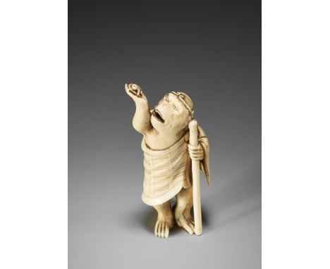 A RARE MARINE TOOTH NETSUKE OF SONGOKUUnsignedJapan, 19th century, Edo period (1615-1868)The monkey king Songoku is dressed i