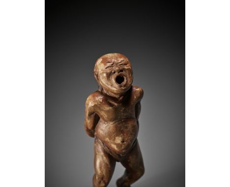 A SUPERB AND UNUSUAL SAISHIKI NETSUKE OF A MAN IN AGONY  UnsignedJapan, 18th century, Edo period (1615-1868)The saishiki (pai