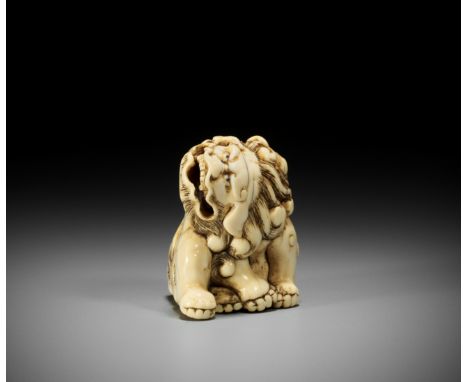 A KYOTO SCHOOL IVORY NETSUKE OF A SHISHIUnsigned Japan, Kyoto, 18th century, Edo period (1615-1868)The shishi seated in an un