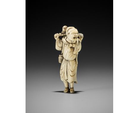 AN IVORY NETSUKE OF A SARUMAWASHI WITH MONKEYUnsignedJapan, 18th century, Edo period (1615-1868)The monkey trainer carved sta