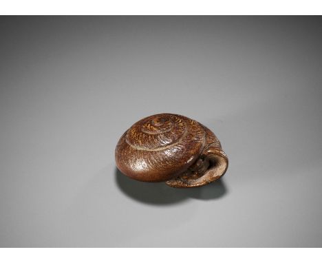 BOKUZAN: A RARE BAMBOO NETSUKE OF A SNAIL RETRACTED WITHIN ITS SHELLBy Bokuzan, signed Bokuzan卜山Japan, 19th century, Edo peri