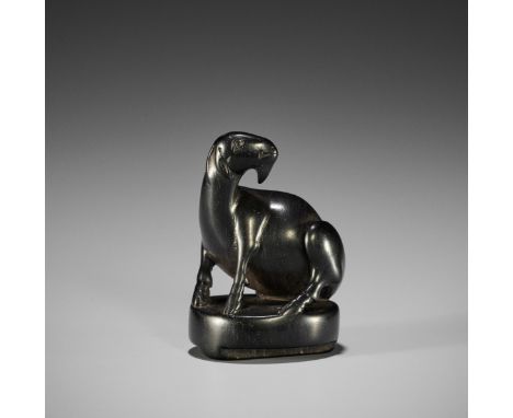 A RARE EBONY WOOD INGYO (SEAL) NETSUKE OF A SINIUUnsignedJapan, 19th century, Edo period (1615-1868)The goat-like mythical be