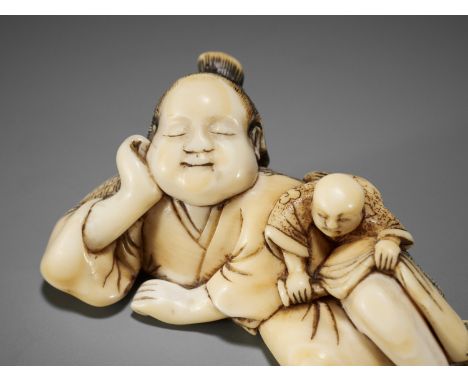 A RARE IVORY SHUNGA NETSUKE OF A SLEEPING OKAME AND BOY WITH HARIKATAUnsigned Japan, 18th century, Edo period (1615-1868)Publ