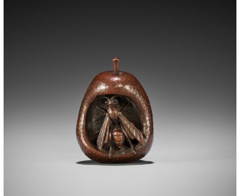 GEKKO: A SUPERB WOOD NETSUKE OF A WASP INSIDE DECAYING PEARBy Gekko, signed Gekko 月江Japan, Nagoya, second half of 19th centur