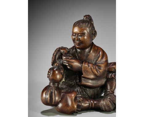 SHOKO: A RARE WOOD NETSUKE OF URASHIMA TARO WITH TURTLEBy Shoko Suganoya, signed Shoko 尚古Japan, Takayama, Hida school, 19th c
