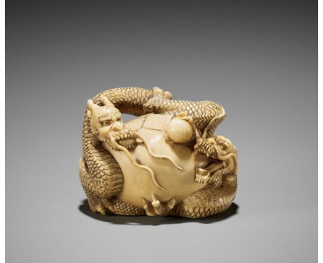 SADAHIRO: A RARE IVORY NETSUKE OF TWO HATCHING DRAGONSBy Sadahiro, signed Sadahiro 定廣Japan, Osaka, 19th centuryWell carved as