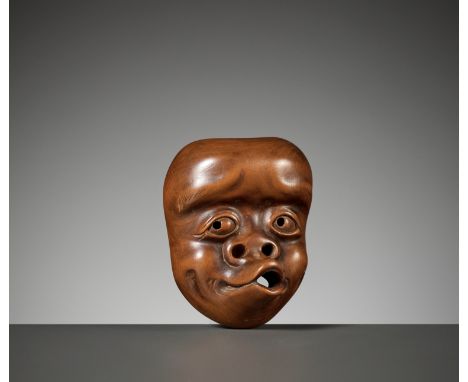 DEME UMAN: A WOOD MASK NETSUKE OF USOFUKIBy Deme Uman, signed Deme Uman 出目右滿Japan, Edo (Tokyo), early 19th century, Edo perio