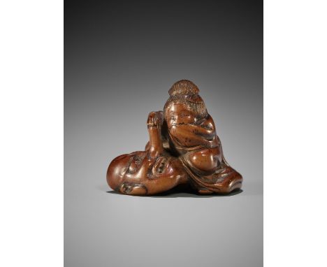 KASHUN: A WOOD SHUNGA NETSUKE OF OKAME CARESSING A TENGU MASKBy Kashun, signed Kashun 花春Japan, 19th century, Edo period (1615