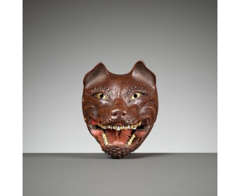 HARUUJI: A SUPERB AND LARGE PAINTED WOOD MASK NETSUKE OF A KITSUNE (FOX)By Haruuji (Ujihara), signed Haruujii 春氏Japan, late 1
