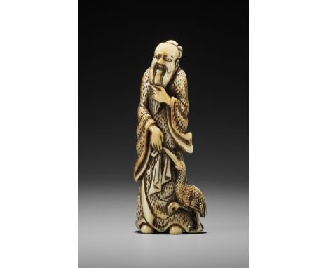 A SUPERB TALL STAG ANTLER NETSUKE OF A SAGE WITH CRANEUnsignedJapan, Kyoto, 18th century, Edo period (1615-1868)Finely carved