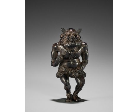 ISSAI: AN UNUSUAL KUROGAKI WOOD NETSUKE OF AN ONIBy Issai, signed Sai 齋 Japan, 19th century, Edo period (1615-1868)The demoni
