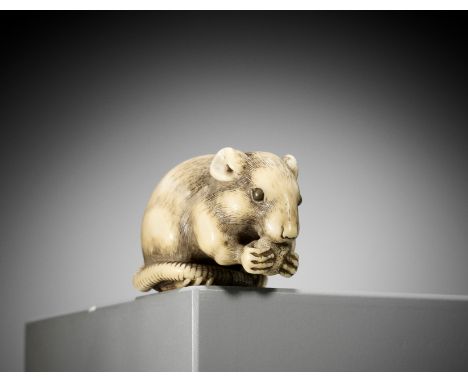 OKATORI: A SUPERB IVORY NETSUKE OF A RAT EATING A FRUITBy Yamaguchi Okatori, signed Okatori 岡隹Japan, Kyoto, early 19th centur