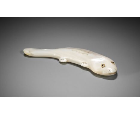 A RARE AND LARGE MOTHER-OF-PEARL NETSUKE OF A NAMAZUUnsignedJapan, 18th/19th century, Edo period (1615-1868)Carved from a lar