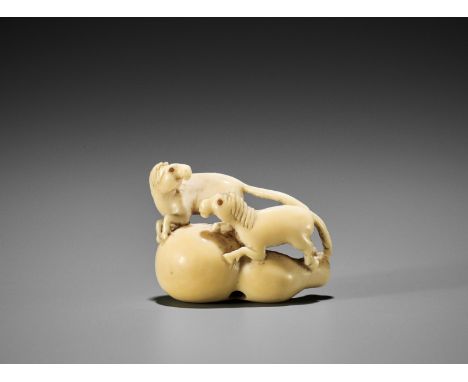 RANICHI: AN IVORY NETSUKE OF TWO HORSES EMERGING FROM CHOKARO SENNIN'S GOURD  By Ranichi, signed Ranichi 蘭一Japan, Kyoto, earl