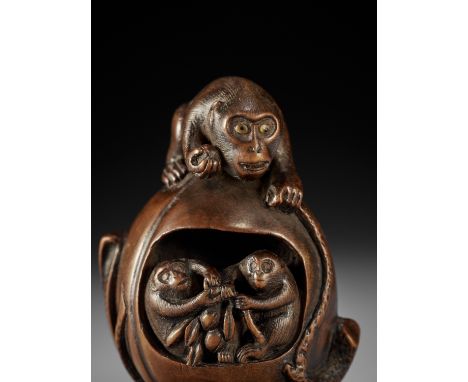 MASAHIRO: A FINE WOOD NETSUKE OF A MONKEY WITH TWO YOUNG INSIDE PEACHBy Masahiro, signed Masahiro 正廣Japan, second half of 19t