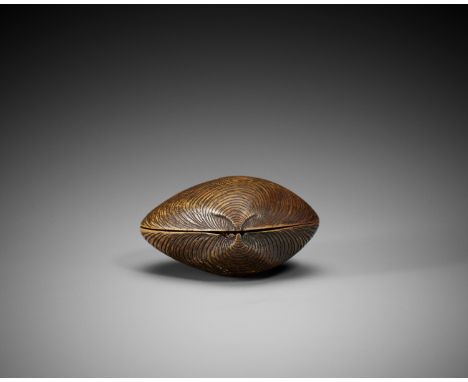 A RARE SHUNGA WOOD NETSUKE OF A HAMAGURI CLAM WITH EROTIC SCENE INSIDE  UnsignedJapan, 19th century, Edo period (1615-1868)Th