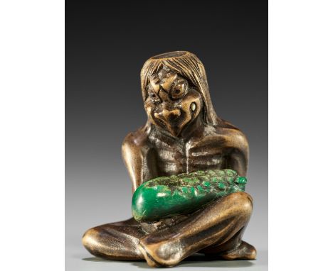 JUICHI: A FINE WOOD NETSUKE OF A KAPPA WITH CUCUMBERBy Juichi (Toshikazu), signed Juichi 壽一Japan, Edo (Tokyo), mid-19th centu