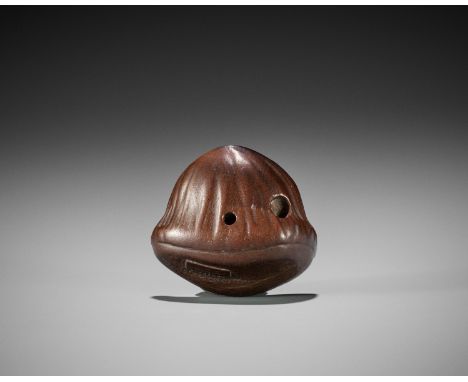 TADATOSHI: A FINE NAGOYA SCHOOL WOOD NETSUKE OF A FLATTENED CHESTNUTBy Tadatoshi, signed Tadatoshi 忠とし（忠利）Japan, Nagoya, earl