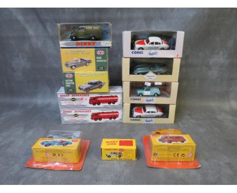 TWELVE BOXED DIE CASE VEHICLES, to include two Dinky 943 Leyland octopus Esso tankers, Atlas Dinky 111 Triumph TR2, Atlas Din