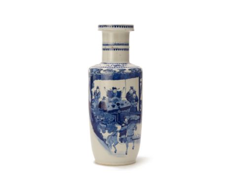 A BLUE AND WHITE PORCELAIN ROULEAU VASE
Of Kangxi style, probably 19th Century or later
Decorated with figures around a table