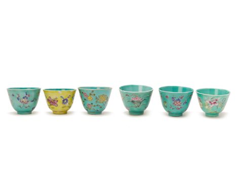 A GROUP OF SIX TURQUOISE OR YELLOW GROUND TEA BOWLS
Probably first half of 20th Century
Five decorated with lotus and chrysan
