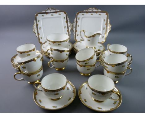 A FORTY-PIECE PARAGON FINE BONE CHINA TEA SERVICE consisting of twelve cups, saucers and side plates, two sandwich plates, mi