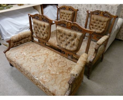 AN INLAID MAHOGANY THREE PIECE LOUNGE SUITE, circa 1900 of two seater couch and matching armchairs, all with button upholster