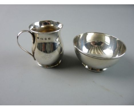 A MINIATURE SILVER CREAM JUG AND SUGAR BASIN each of plain form, the bowl on a slightly raised pedestal, 3.5 troy ozs, Birmin