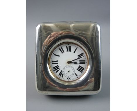 A PLAIN SILVER FRAMED TRAVELLING CLOCK with white enamel dial, Roman numerals and sweep seconds dial, Birmingham 1902