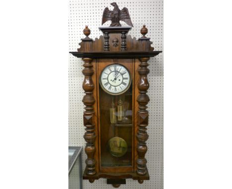 A CIRCA 1900 VIENNA STYLE WALNUT CASED WALL CLOCK, twin weight with pendulum, the enamel dial marked 'G B' within a crowned a