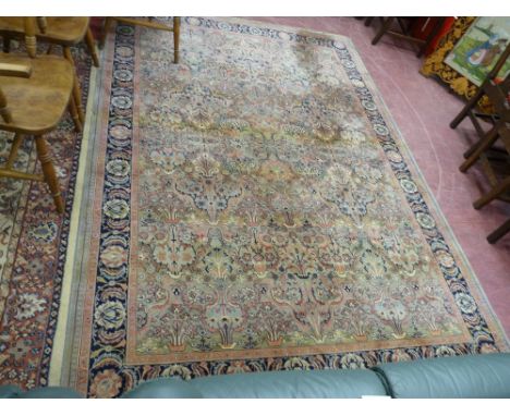 A LARGE MID 20th CENTURY PURE NEW WOOL CARPET with tasselled ends and all over floral repeat pattern, multi-bordered, 288 x 2