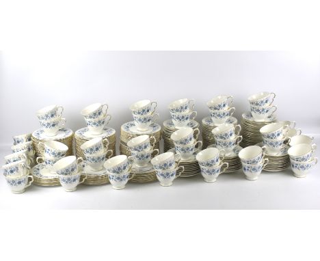 An extensive quantity of Colclough bone china cups and saucers. Fifty trio settings of a tea cup, saucer and plate, decorated