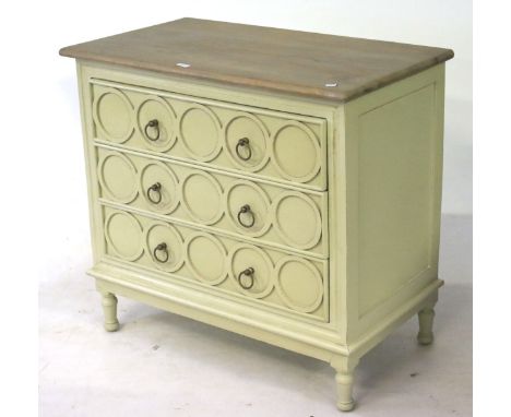 A contemporary chest of drawers. Three long drawers with metal handles, raised on turned supports, the lower section painted 