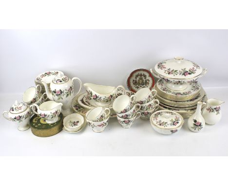 A Wedgwood tea and dinner service in the 'Hathaway Rose' pattern. Including tureens, cups and saucers, plates, etc.