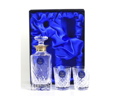A miniature silver mounted crystal glass whisky decanter set from the Abbey Collection. Decanter and stopper H15cm with two s