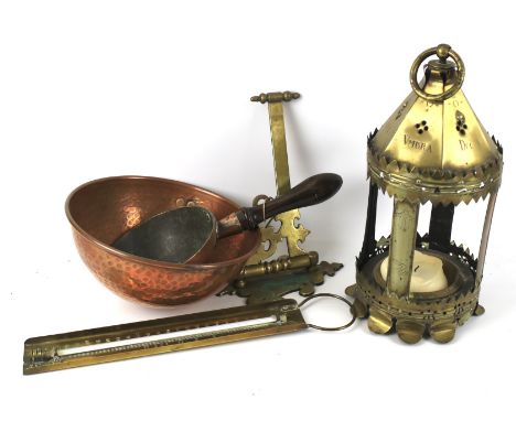 An assortment of copper and brass items. Including: a 19th century copper pan with turned handle, a pierced brass lantern eng