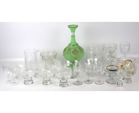 An assortment of glassware. Including drinking glasses, desert dishes, a green vase, etc. Condition Report: Green vase, H30cm