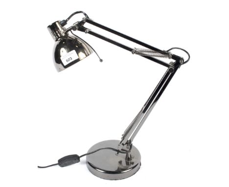 A Lloytron halogen anglepoise table desk light. Model 855, with smokey gun metal finish 