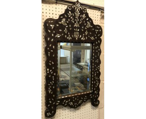 A wooden mother of pearl set Indian style mirror, the rectangular plate with bevelled edge, 41 cm x 73 cm high