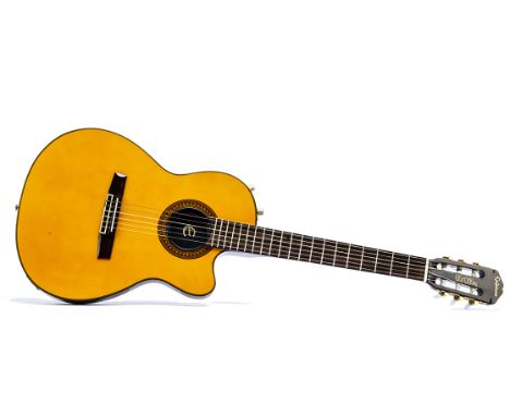 Epiphone Guitar, an Epiphone Electro-Acoustic 'Chet Atkins' guitar in good condition with few light marks on back comes in a 