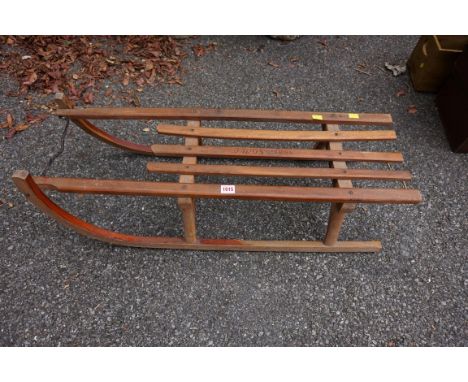 An old child's wooden sled.&nbsp; 