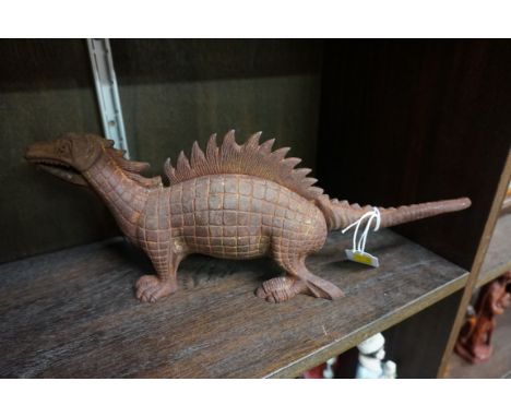 A cast iron novelty dinosaur nut cracker,&nbsp;35.5cm wide. 