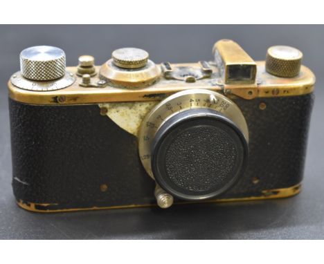 Cameras:&nbsp;a Leica Standard, with Leitz Elmar f=3.5cm 1:3.5 lens, no.252491; together with an Ensign 'Greyhound', in leath