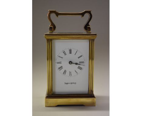 A brass carriage clock, the dial inscribed 'Mappin &amp; Webb Ltd', height including handle 15cm.&nbsp; 