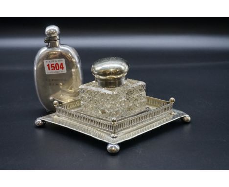 An electroplate and cut glass inkwell,&nbsp;22.5cm wide; together with an electroplated hip flask. 