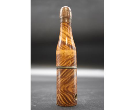 Treen: an antique faux grained metamorphic novelty 'champagne bottle' pipe, 14cm long. 