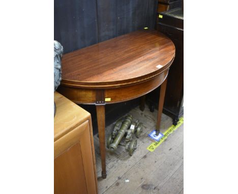 A George III mahogany and line inlaid demi lune card table, 91.5cm wide.&nbsp; 